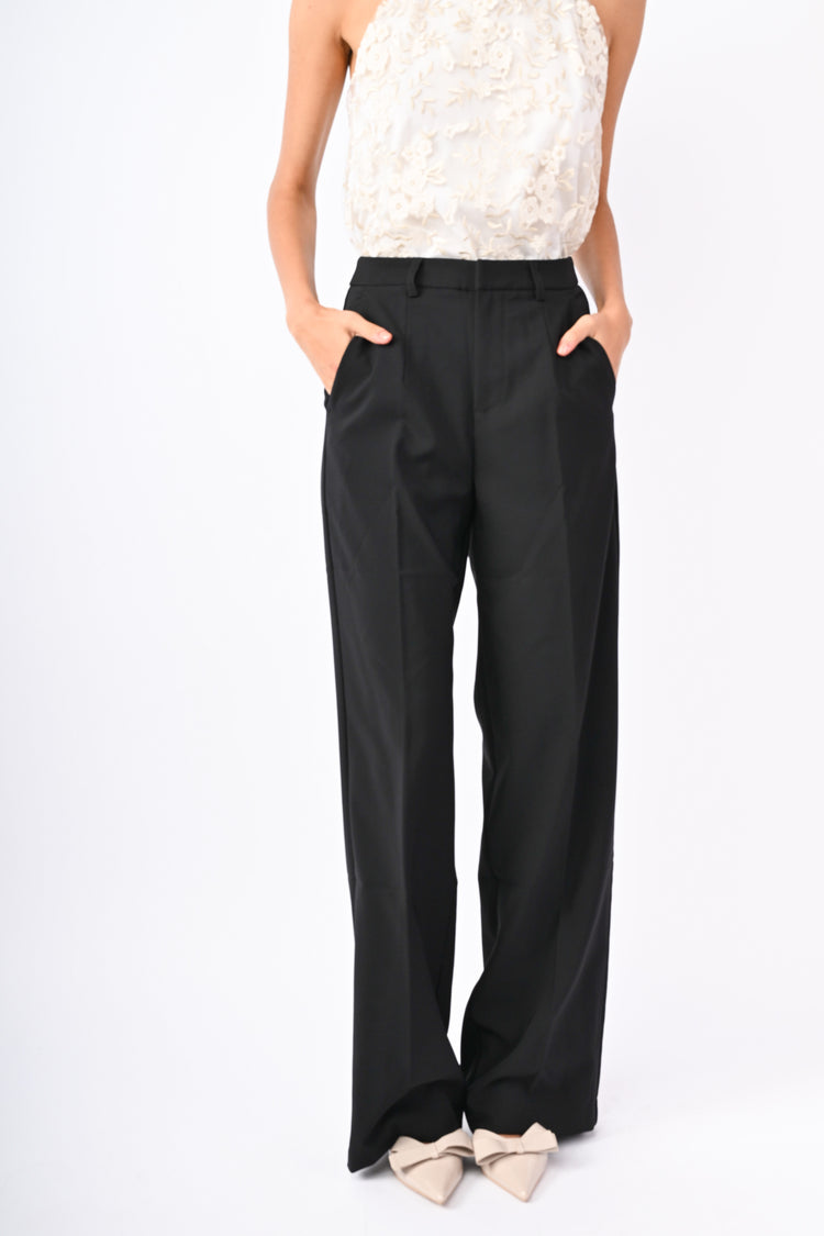 Pantaloni palazzo con piega stirata