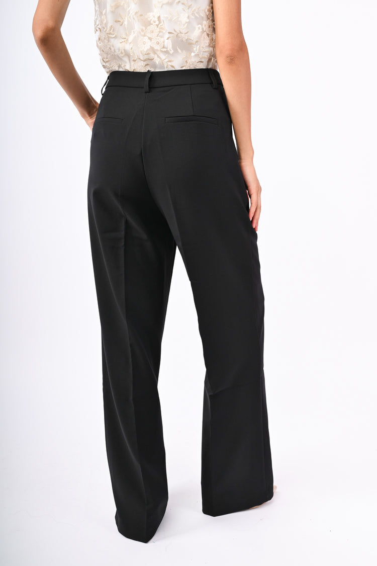 Pantaloni palazzo con piega stirata