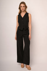 Pantaloni palazzo con cintura in pizzo nero