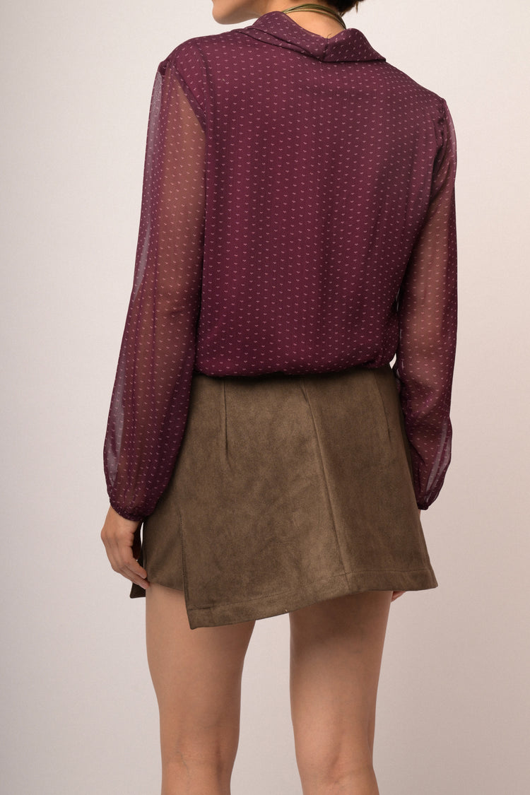Minigonna in faux suede cioccolato con bottone