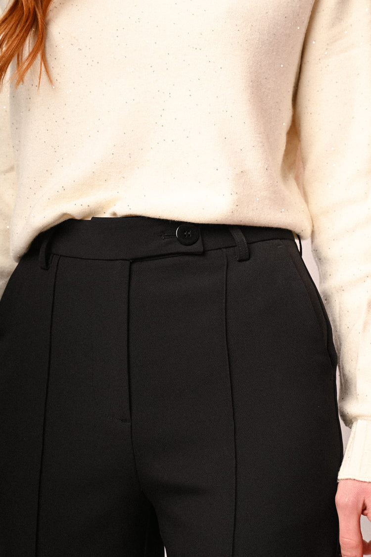 Pantaloni a sigaretta neri con impuntura
