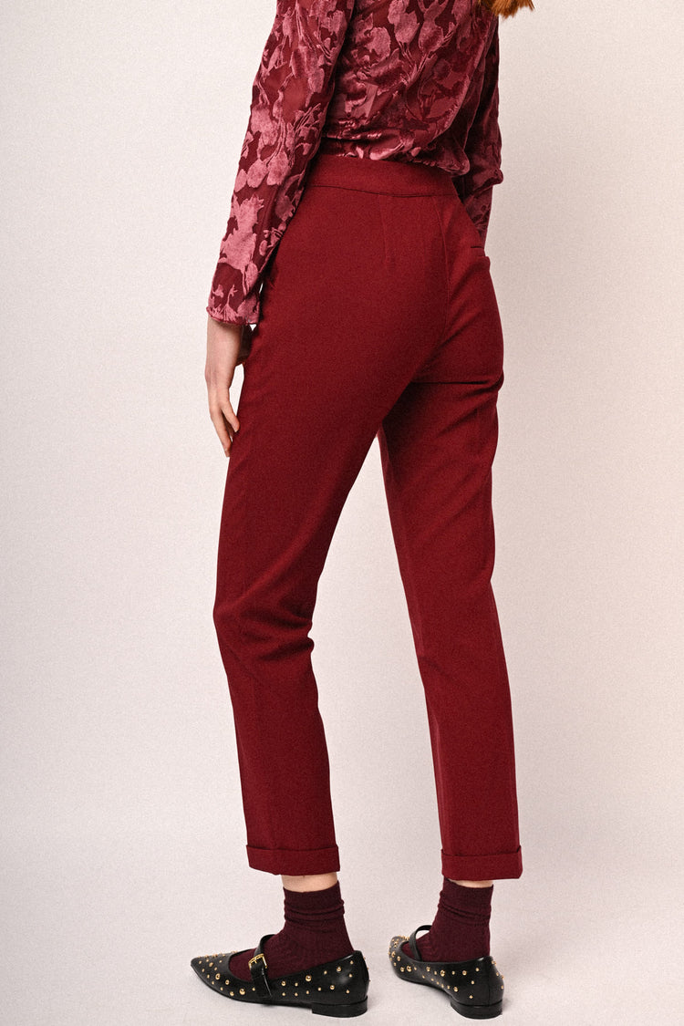 Pantaloni a sigaretta con risvolto