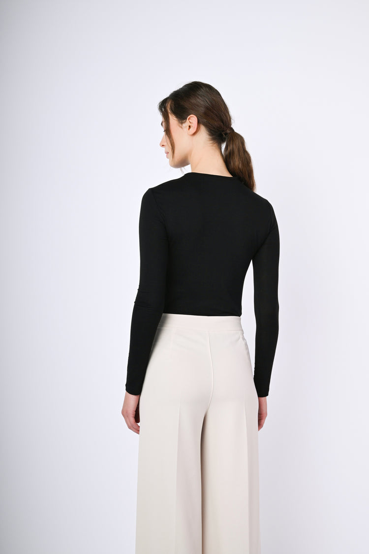 Top crop a maniche lunghe