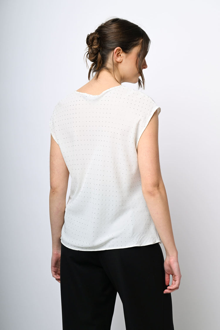 Top con mini borchie