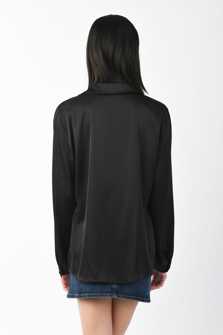 Blusa con taschini