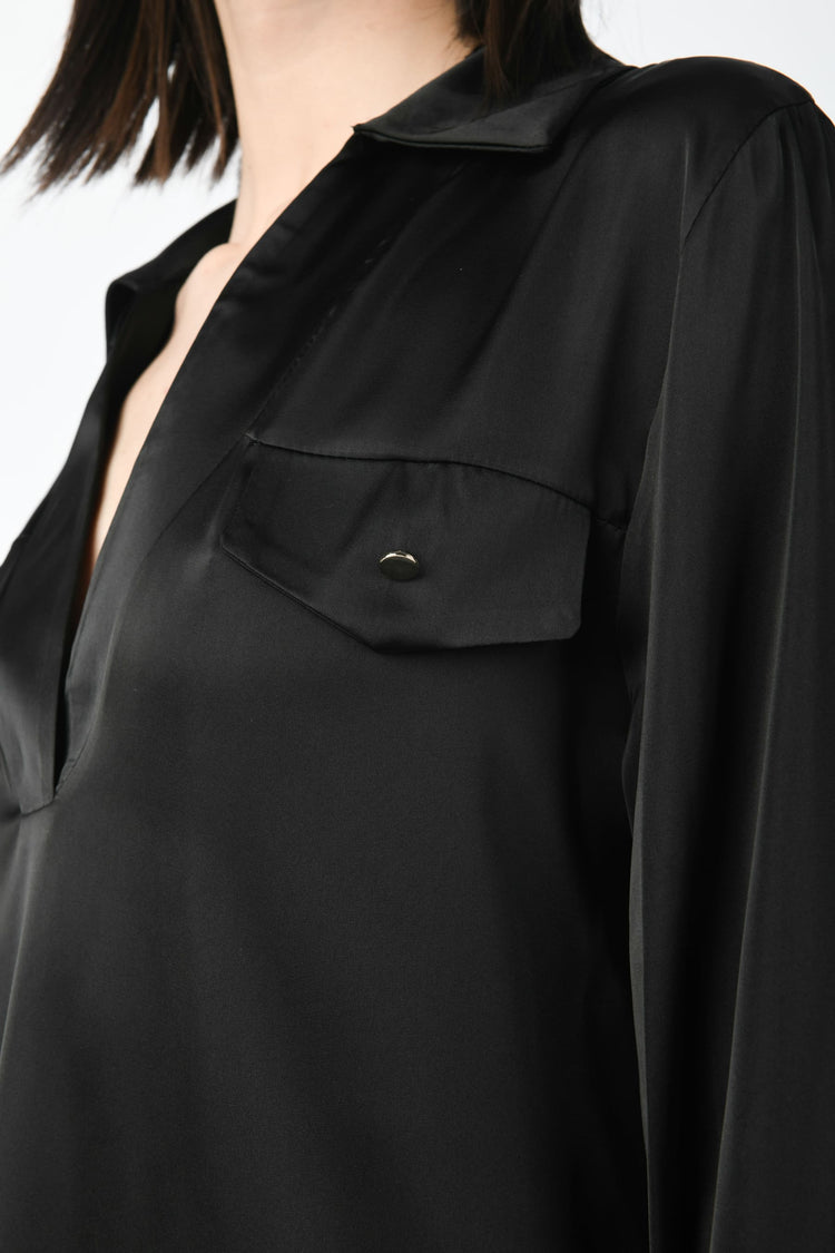Blusa con taschini