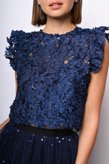 Top crop in pizzo floreale con paillettes