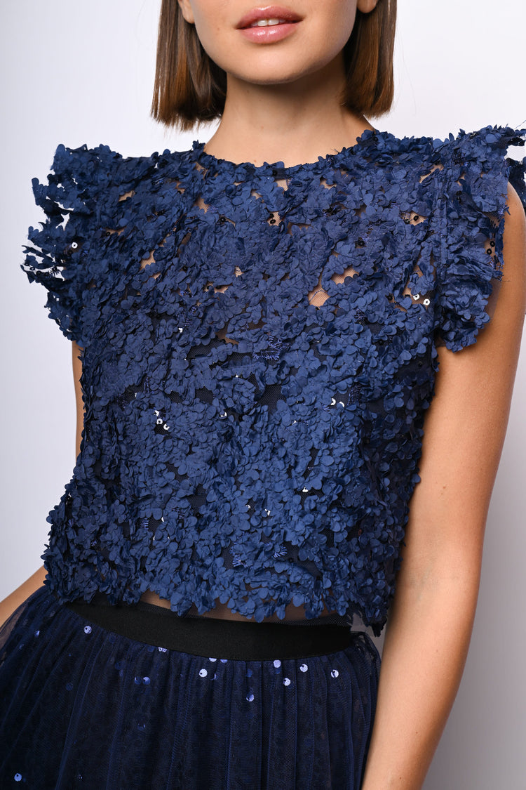 Top crop in pizzo floreale con paillettes
