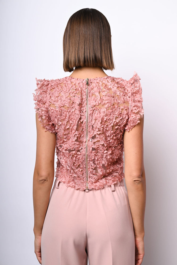 Top crop in pizzo floreale con paillettes