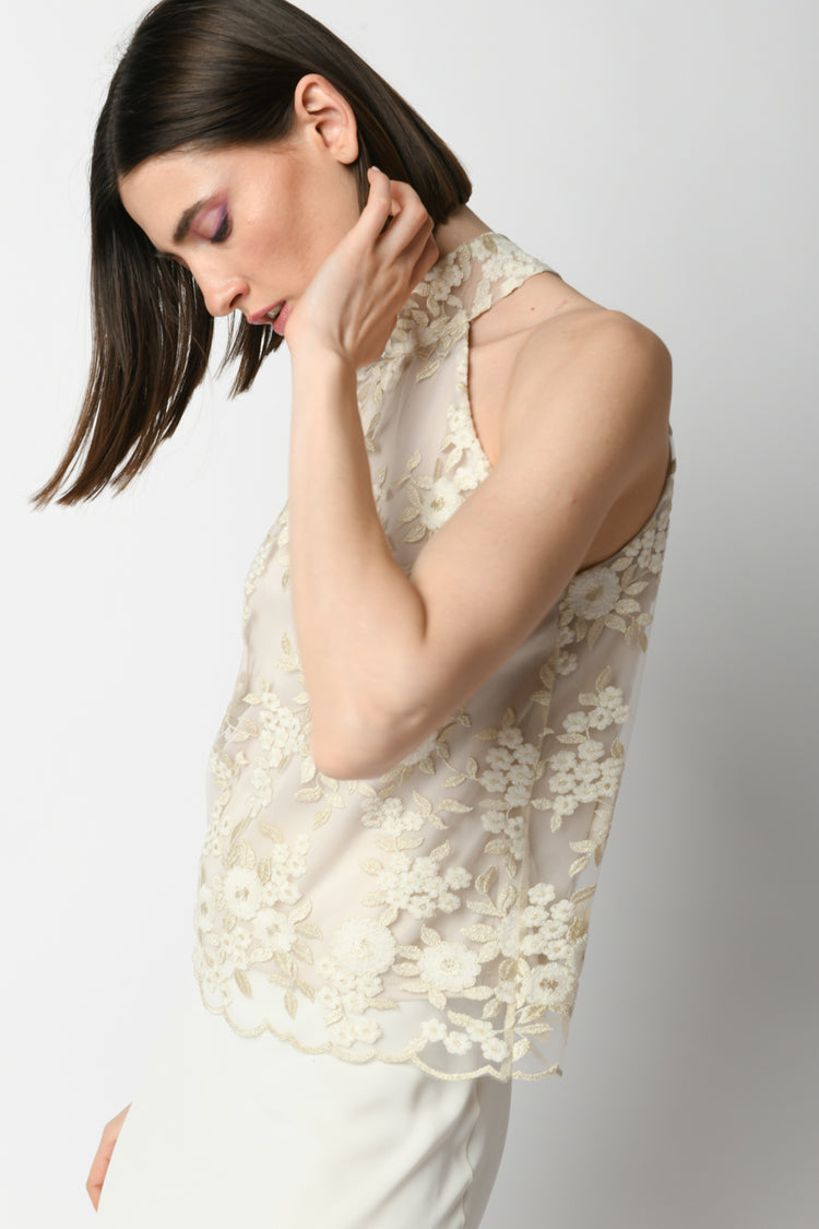 Top in tulle con ricami