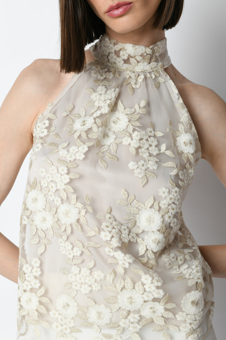 Top in tulle con ricami