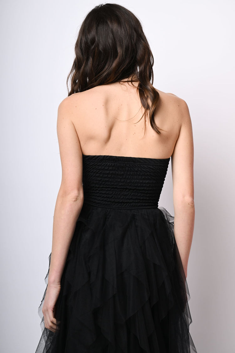 Abito lungo a bustier in tulle con volants
