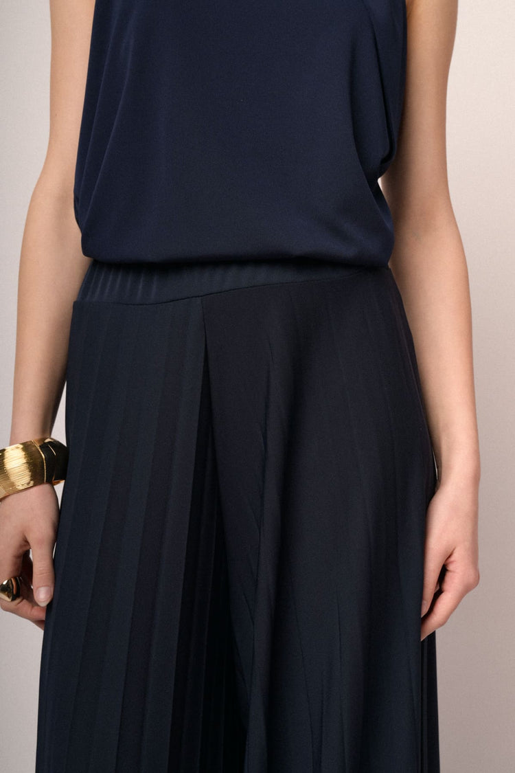 Pantaloni palazzo in tessuto plissé blu
