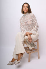 Top a maniche lunghe in pizzo