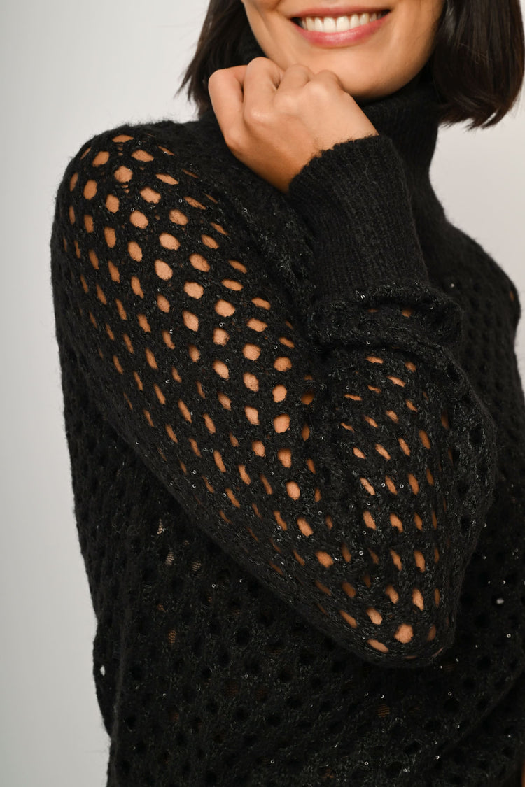 Dolcevita in maglia crochet