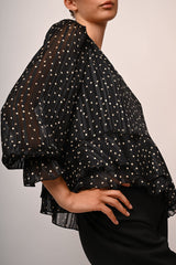 Blusa a pois con volants