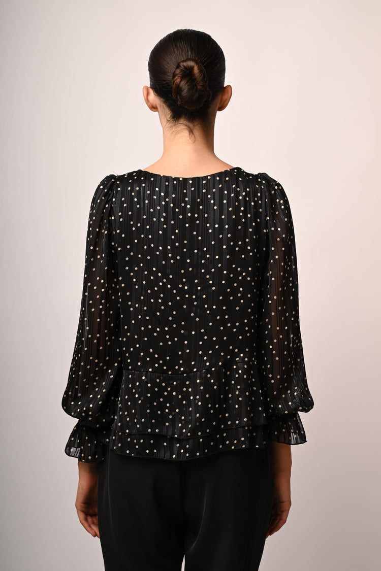 Blusa a pois con volants
