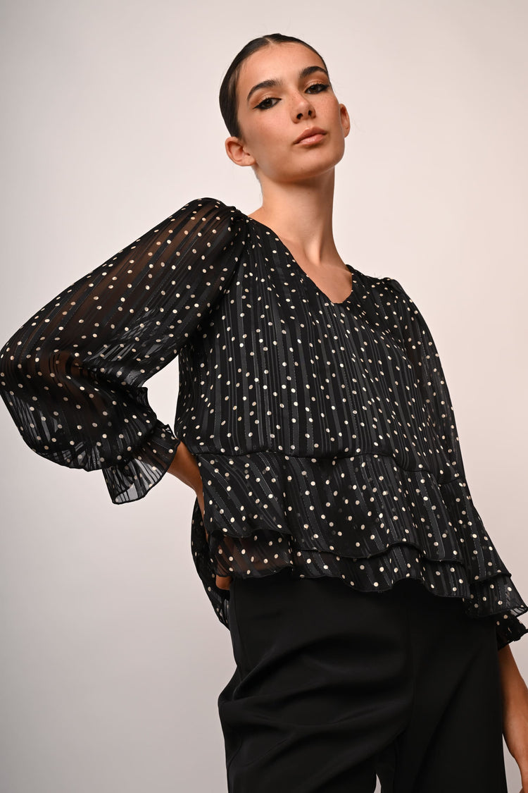 Blusa a pois con volants