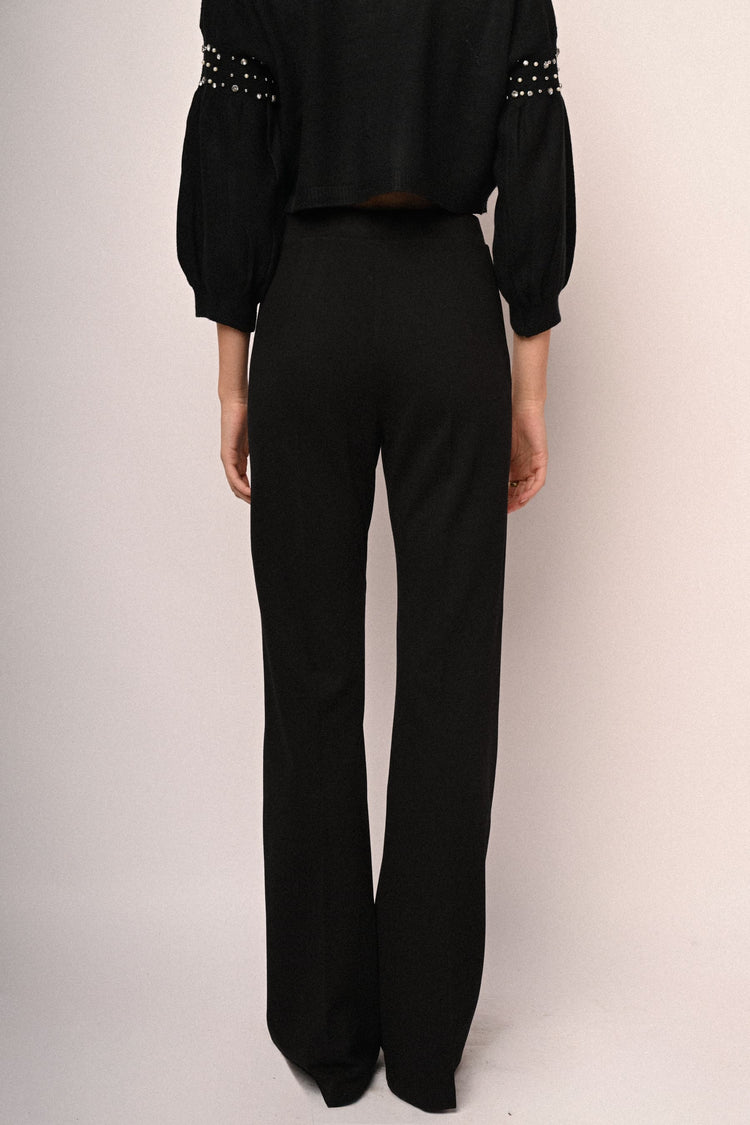Pantaloni svasati con impuntura