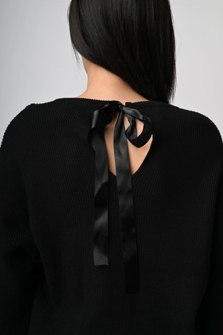 Pull con fiocco sul retro