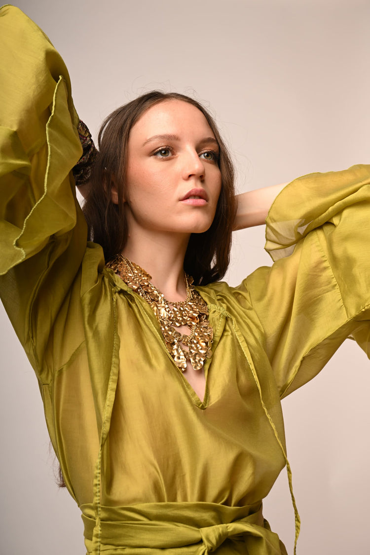 Blusa in mussola con volants