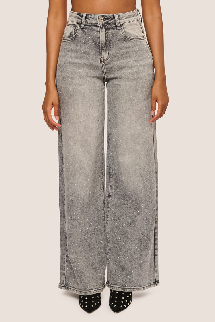 Jeans palazzo con mini borchie