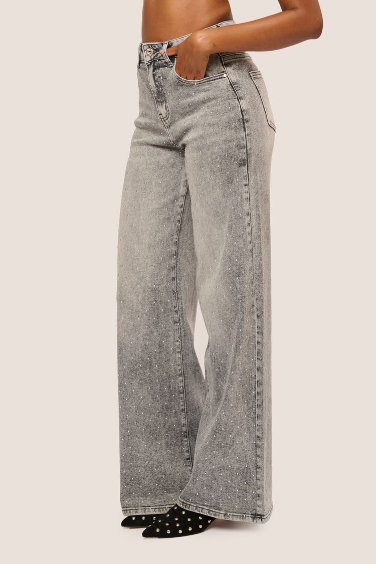 Jeans palazzo con mini borchie