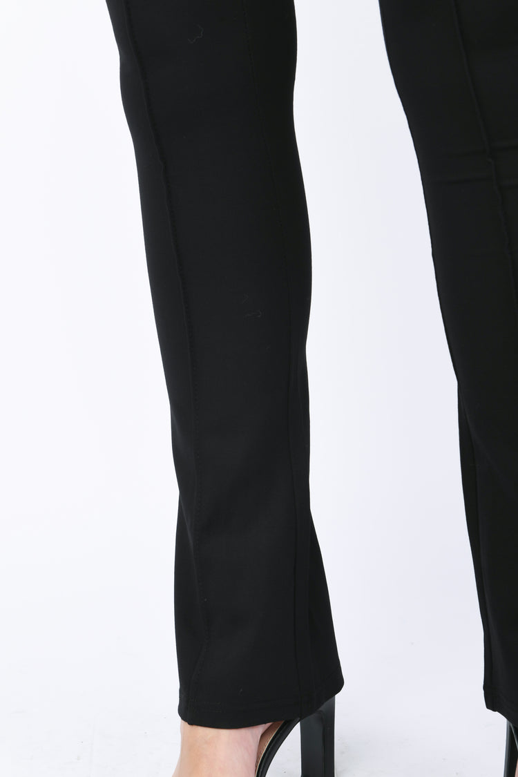 Pantaloni svasati in cotone stretch