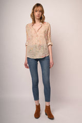 Jeans skinny in denim blu con bottoni