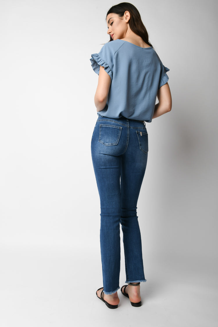 Jeans con bottoni gioiello