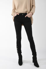 Jeans skinny con bottoni