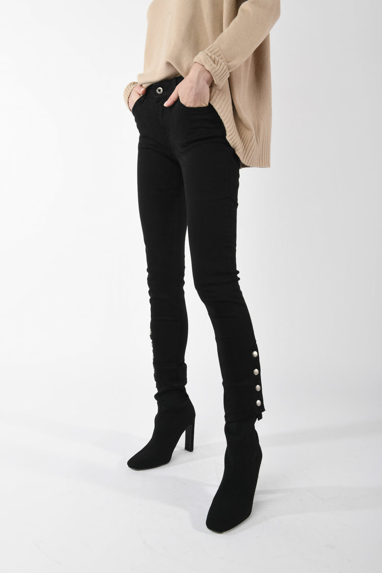 Jeans skinny con bottoni