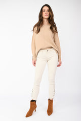 Pantaloni skinny con bottoni