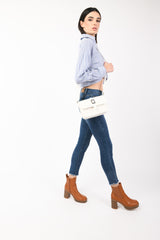 Jeans skinny con bottoni gioiello