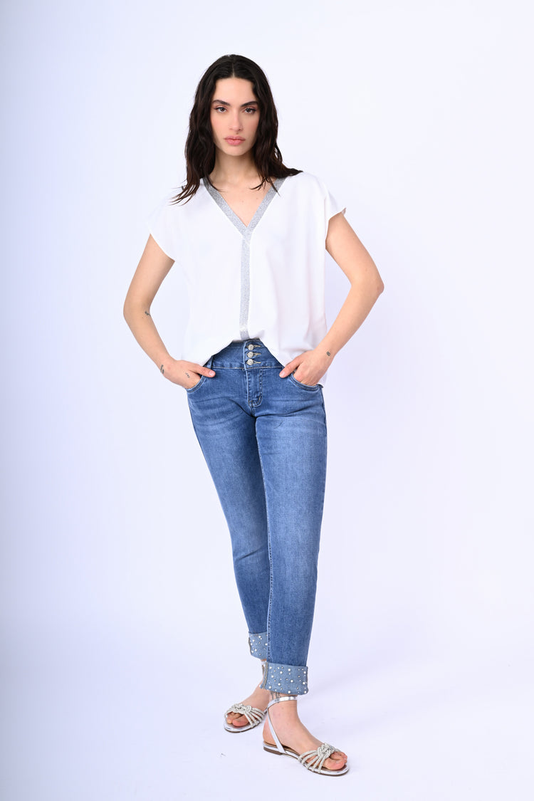 Jeans con perline all'orlo