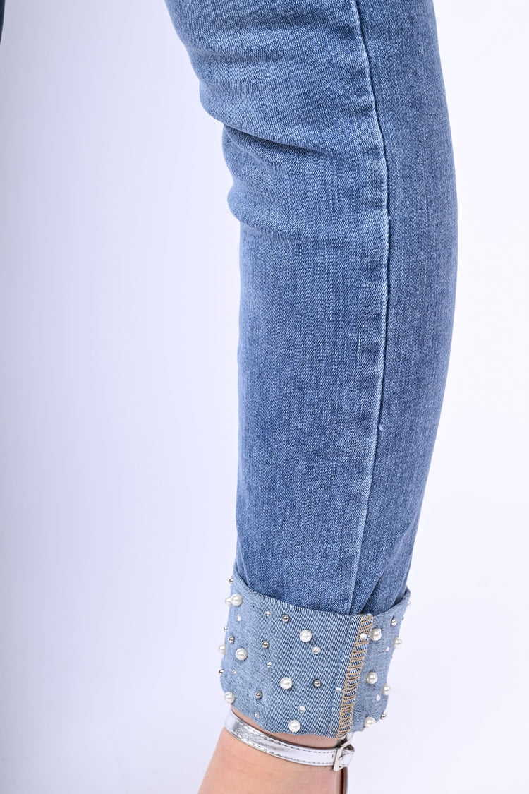 Jeans con perline all'orlo