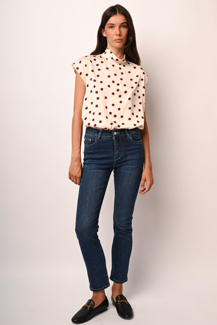 Jeans skinny con bottone gioiello