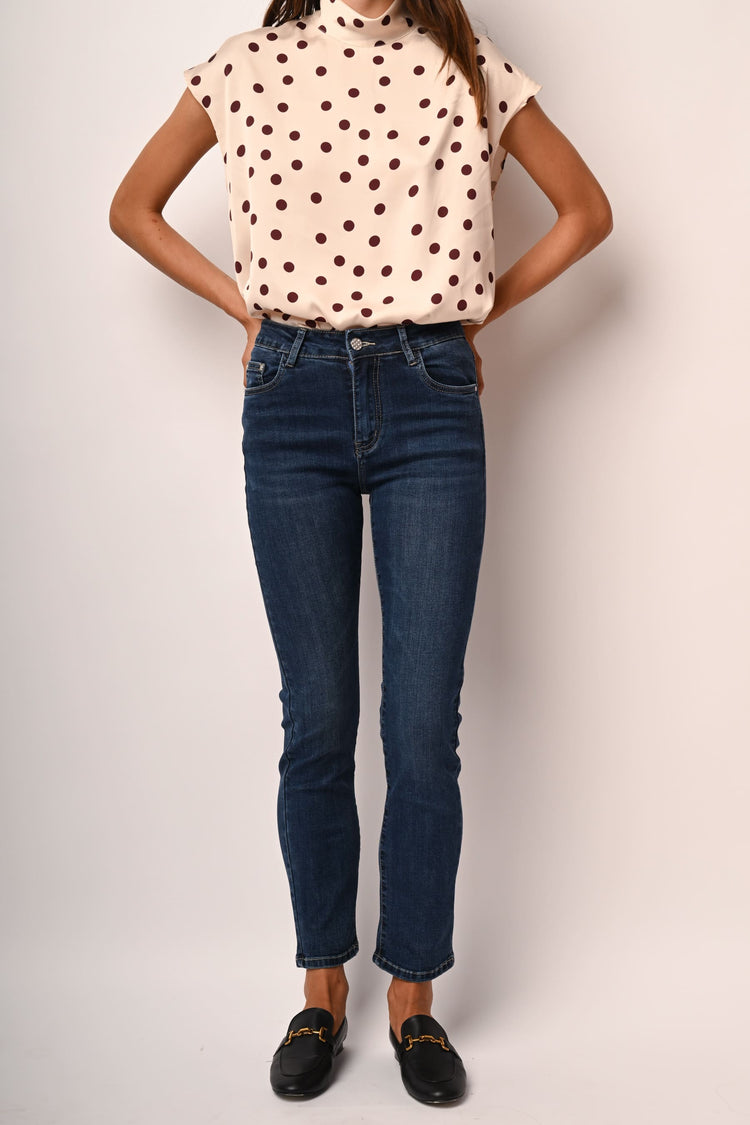 Jeans skinny con bottone gioiello
