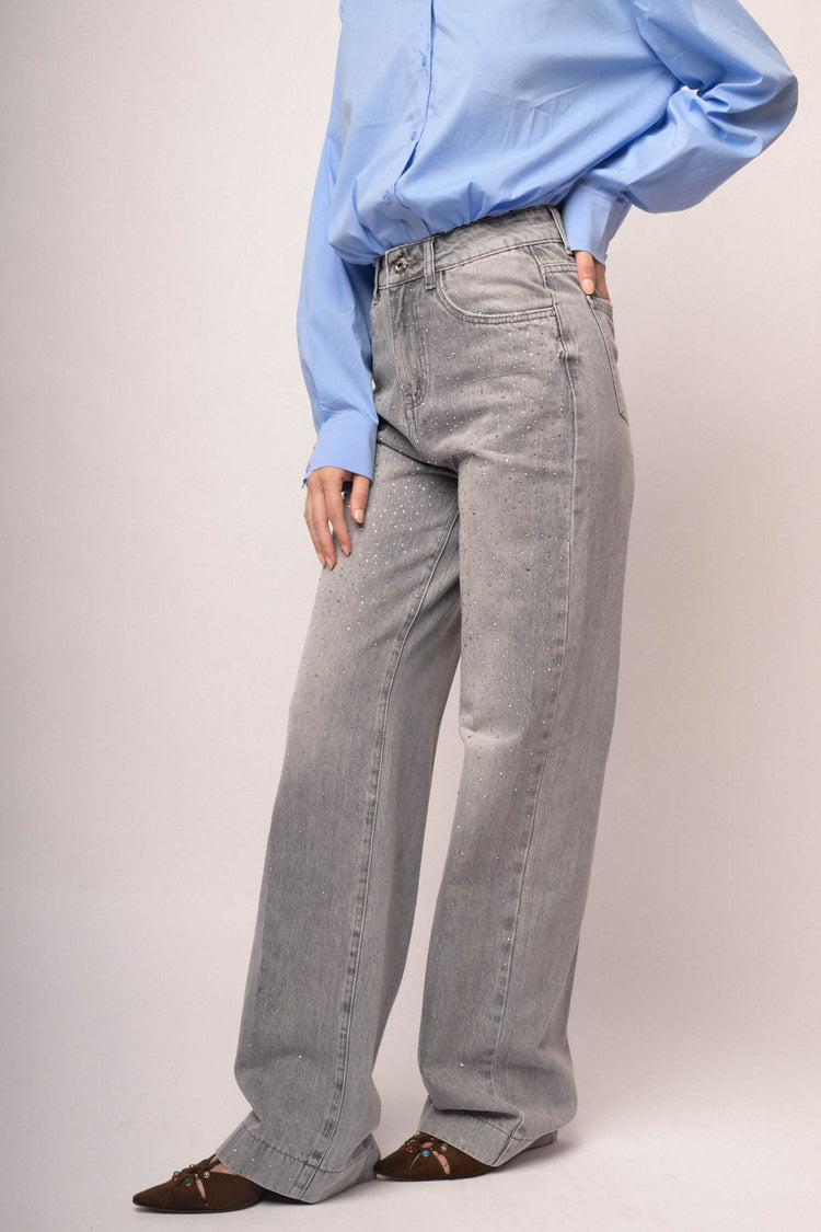 Jeans palazzo in denim grigio con decorazione strass