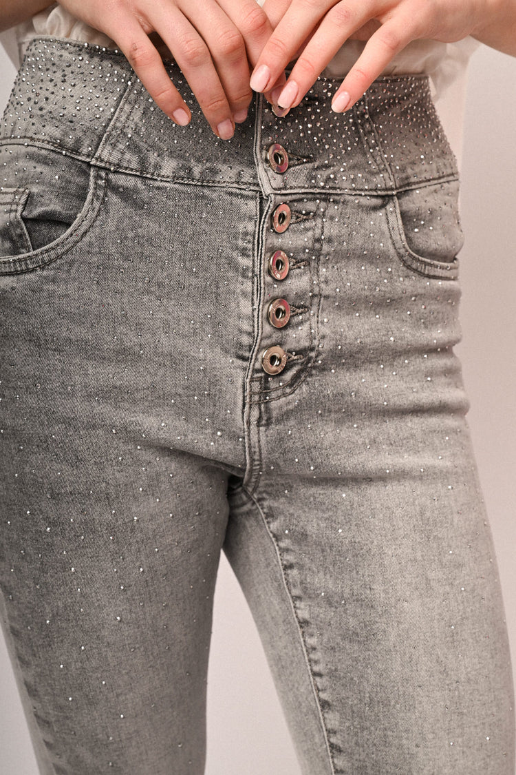 Jeans skinny in denim grigio con decorazione strass