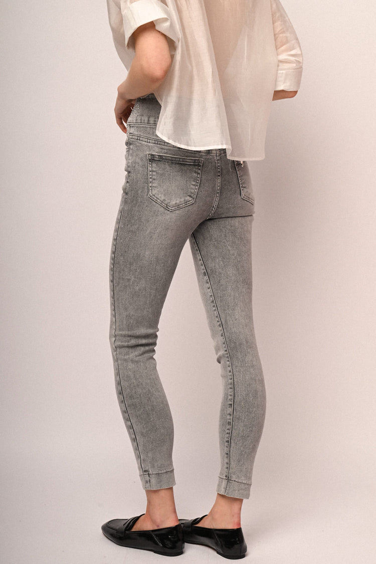 Jeans skinny in denim grigio con decorazione strass