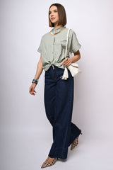 Jeans a gamba ampia con risvolto