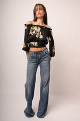 Jeans wide-leg in denim blu con cintura sottile