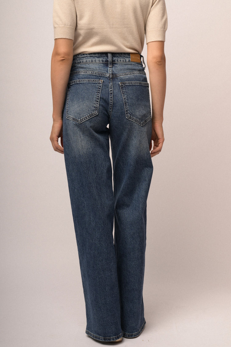 Jeans palazzo in denim blu con nervature laterali