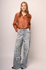 Jeans baggy in denim azzurro a stampa floreale