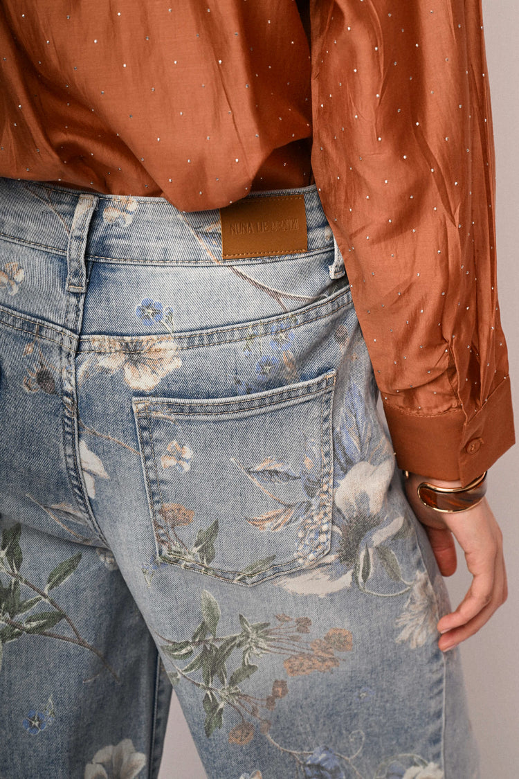 Jeans baggy in denim azzurro a stampa floreale