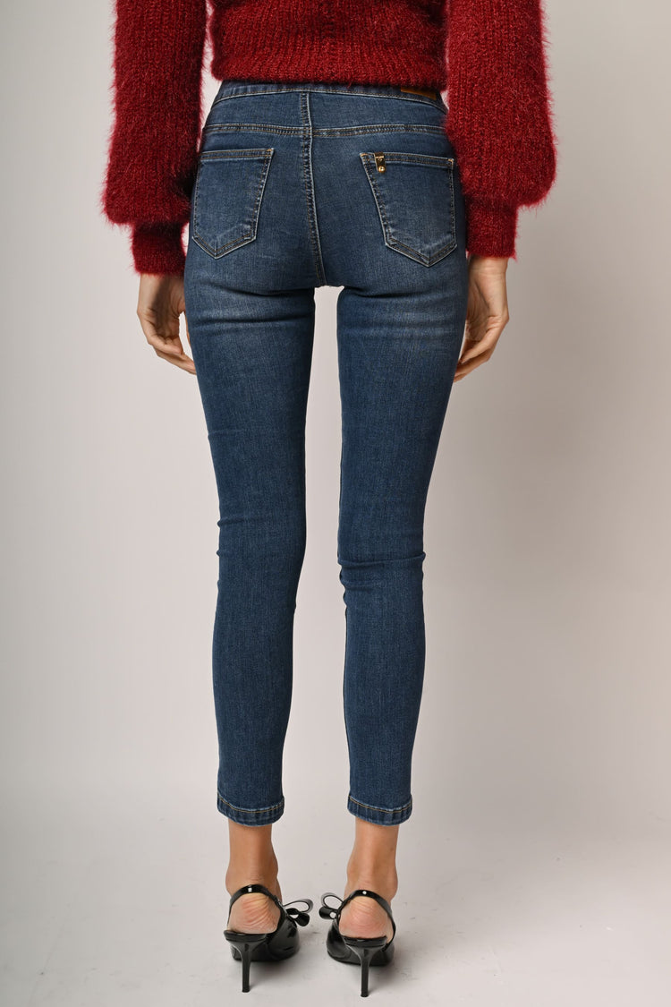 Jeans skinny con bottoni