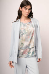 Blazer fluente celeste con revers a scialle