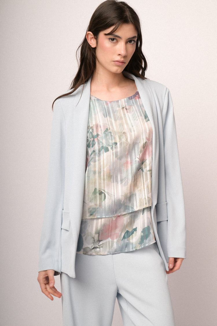 Blazer fluente celeste con revers a scialle