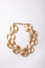 Collana con piastre circolari